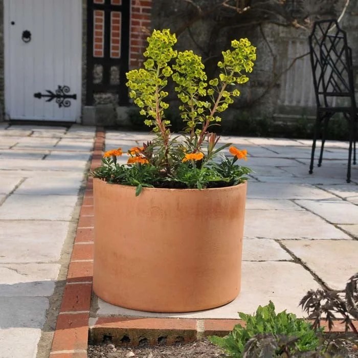 Terracotta spout plant pot